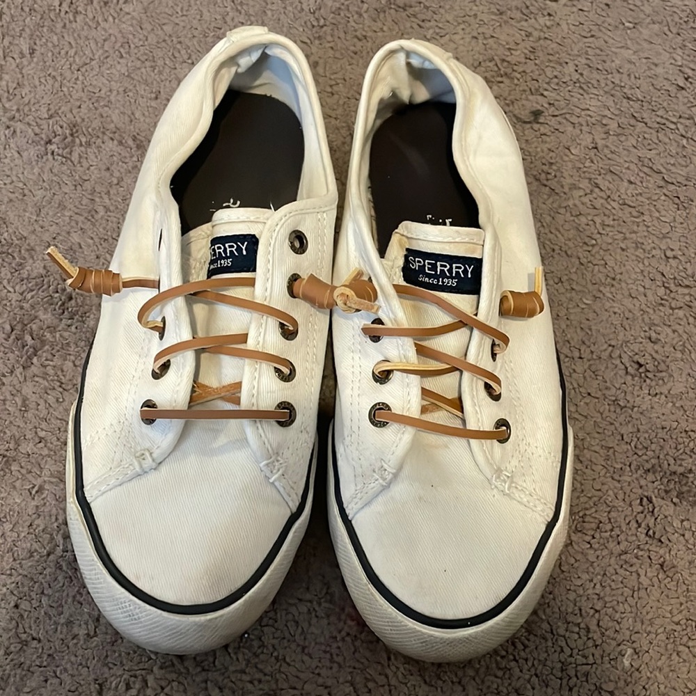 White Sperry sneakers